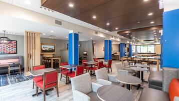Relax in style with comfortable seating and modern decor.