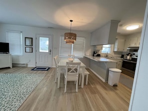 Cottage, 4 Bedrooms | Private kitchen | Coffee/tea maker, full-size fridge, microwave, stovetop