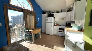 Studio | Private kitchen | Full-size fridge, microwave, stovetop, coffee/tea maker