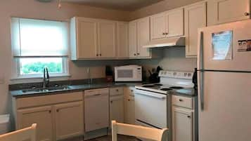 Cottage, 2 Bedrooms | Private kitchen | Full-sized fridge, microwave, stovetop, dishwasher