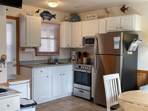 Studio | Private kitchen | Full-size fridge, microwave, stovetop, coffee/tea maker - 9 Nautical Nine Studio Bedroom Condo by RedAwning (Hatteras)