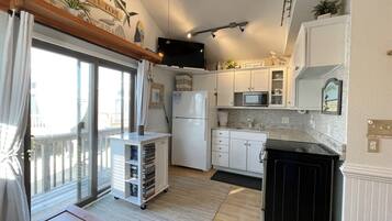 Studio | Private kitchen | Full-sized fridge, microwave, stovetop, coffee/tea maker