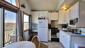 Studio | Private kitchen | Full-sized fridge, microwave, stovetop, coffee/tea maker