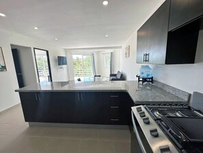 Club Condo | Private kitchen | Full-size fridge, microwave, oven, stovetop - Surf Ranch Popoyo (Tola)