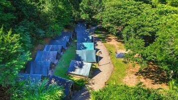 Experience nature's serenity in our secluded, eco-friendly accommodations, set amidst lush green surroundings.