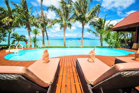 Outdoor pool, free cabanas, pool umbrellas