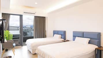 Twin Room, 2 Twin Beds, Balcony | Blackout drapes, soundproofing, free WiFi, bed sheets