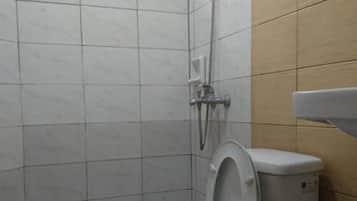 Regadera y toallas