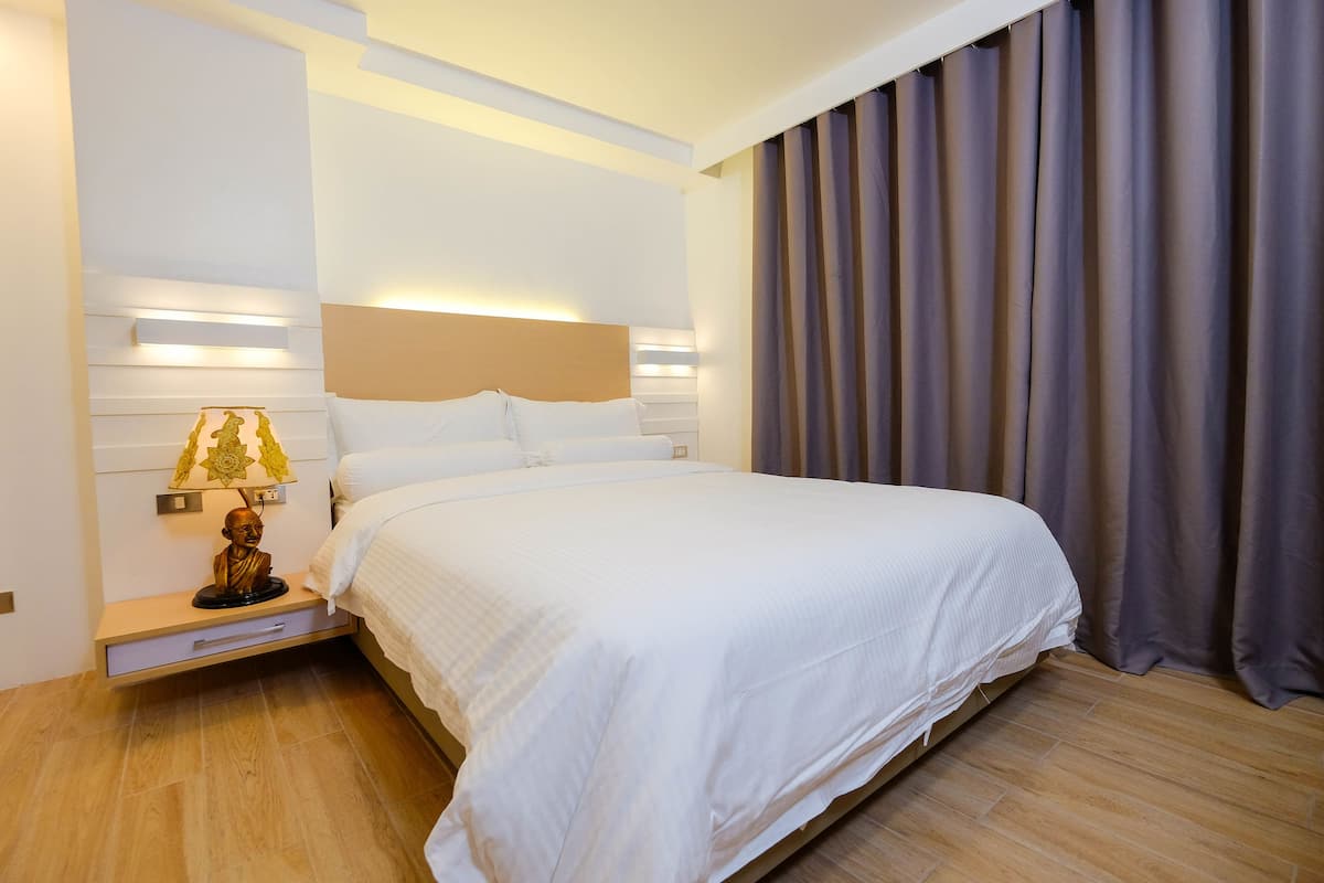 Deluxe kamer | Hypoallergeen beddengoed, verduisterende gordijnen, geluiddichte muren