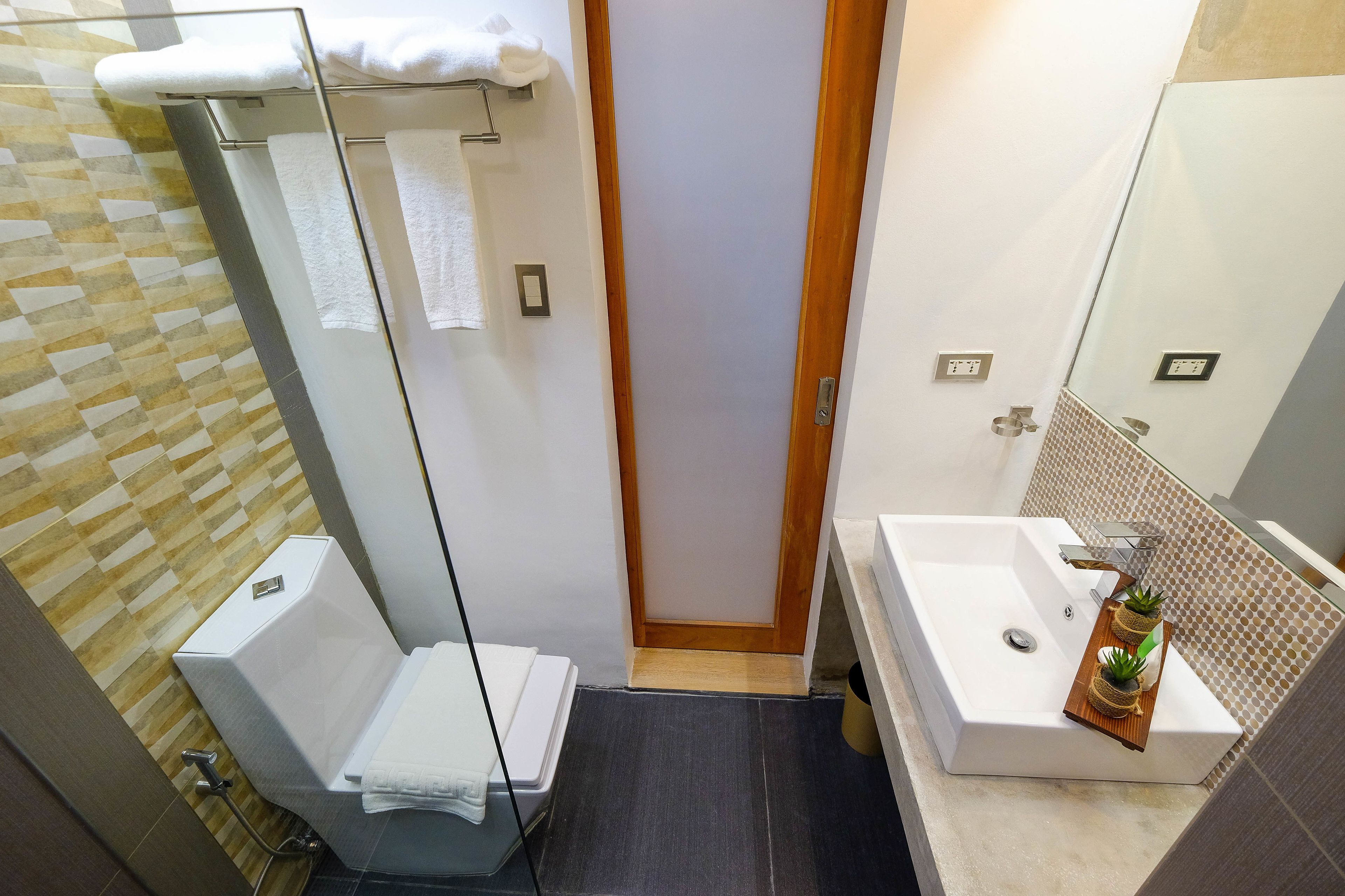 rainfall showerhead, free toiletries, hair dryer, slippers