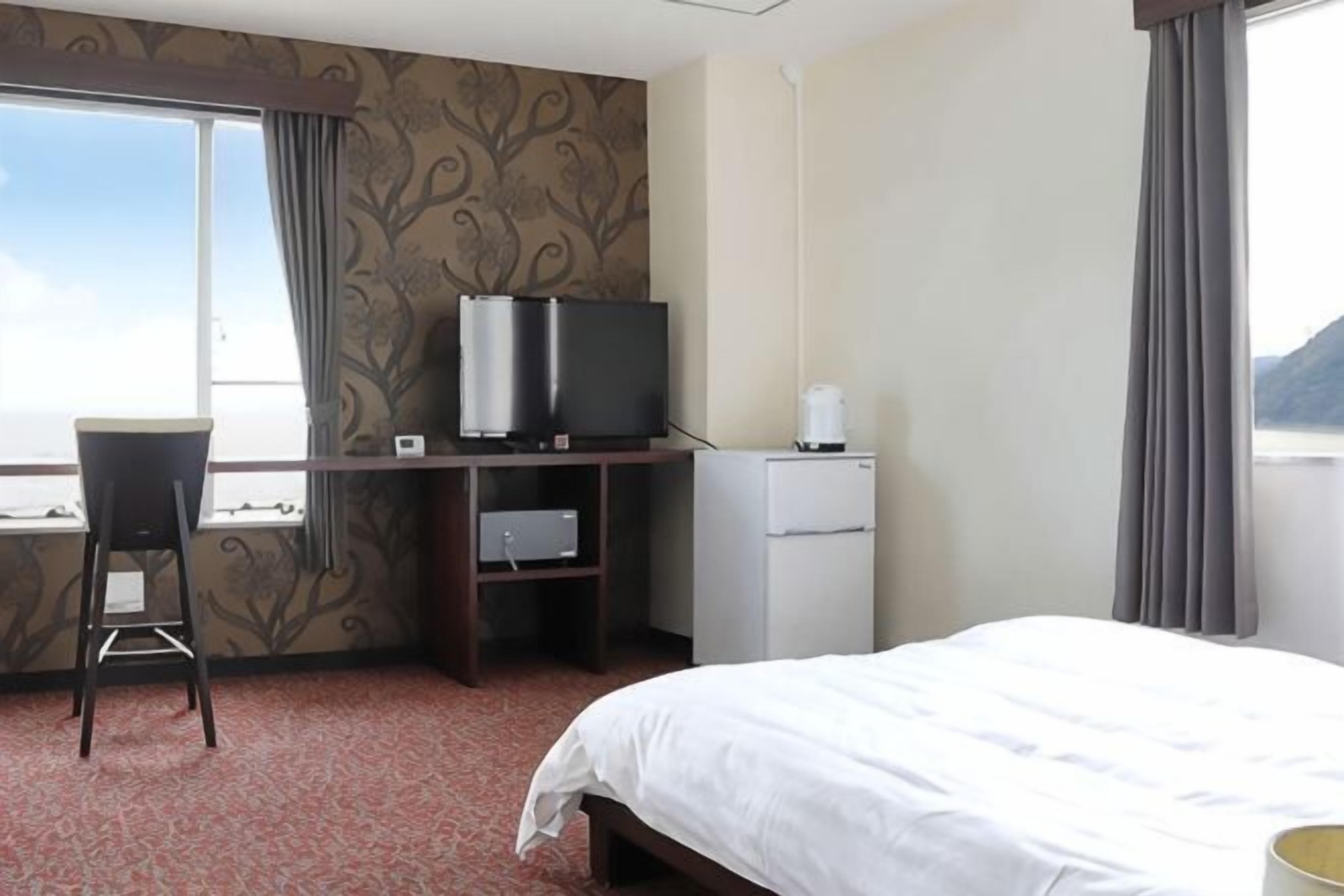 Coffres-forts dans les chambres, draps fournis
