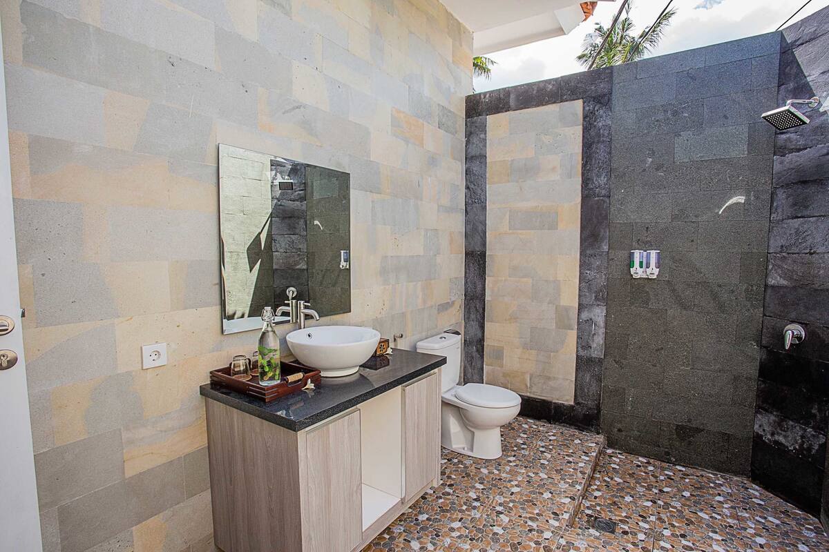 family quadruple room, 2 bedrooms, 2 bathrooms, pool view | bathroom | shower, free toiletries, hair dryer, towels