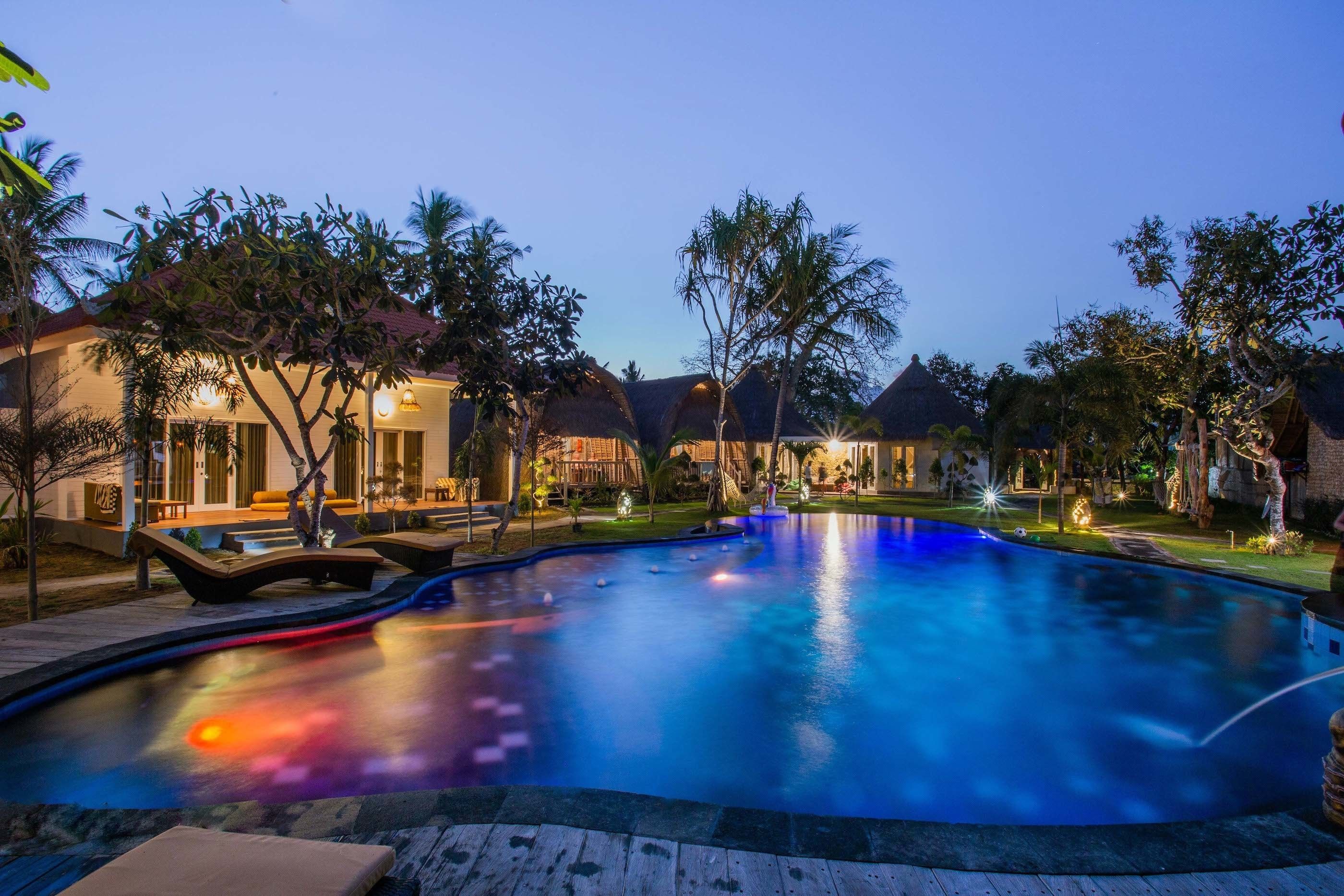 Outdoor pool, open 7:00 AM to 9:00 PM, pool umbrellas, sun loungers