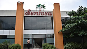 A building with a sign reading "Sentosa." - Sentosa Resorts and Water Park (Pune)