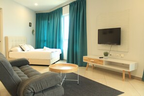 Premium 2 bedroom with 3 Queen Bed | Ruang tamu