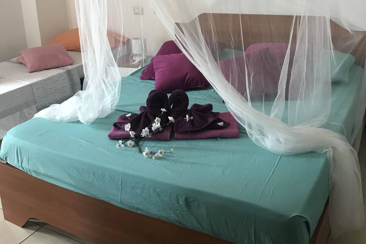 Blackout curtains, iron/ironing board, free WiFi, bed sheets