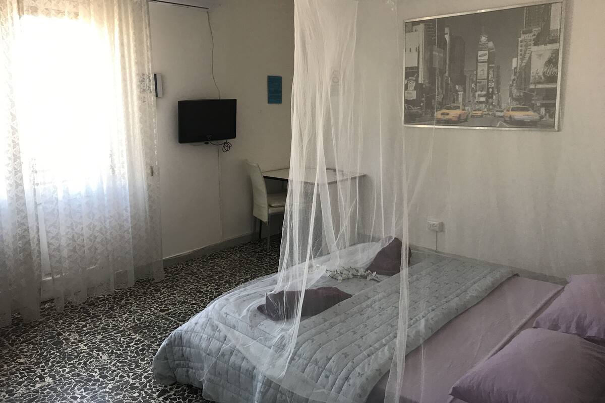 Blackout curtains, iron/ironing board, free WiFi, bed sheets