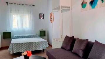 Superior Studio, 1 Bedroom | Living area | Flat-screen TV