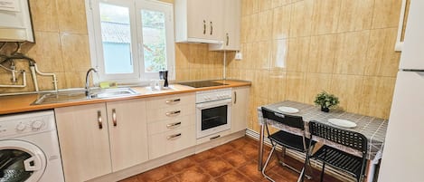 Apartment, 3 Bedrooms (8 pax) | Private kitchen | Full-sized fridge, microwave, stovetop, cookware/dishes/utensils