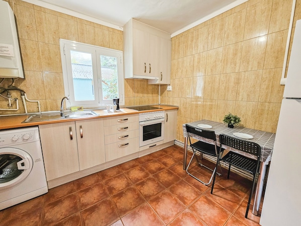 Apartment, 3 Bedrooms (8 pax) | Private kitchen | Full-size fridge, microwave, stovetop, cookware/dishes/utensils