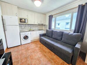 Apartment, 3 Bedrooms (7 pax) | Living area | Flat-screen TV