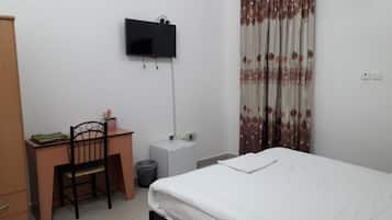 Edredones de plumas, minibar, escritorio