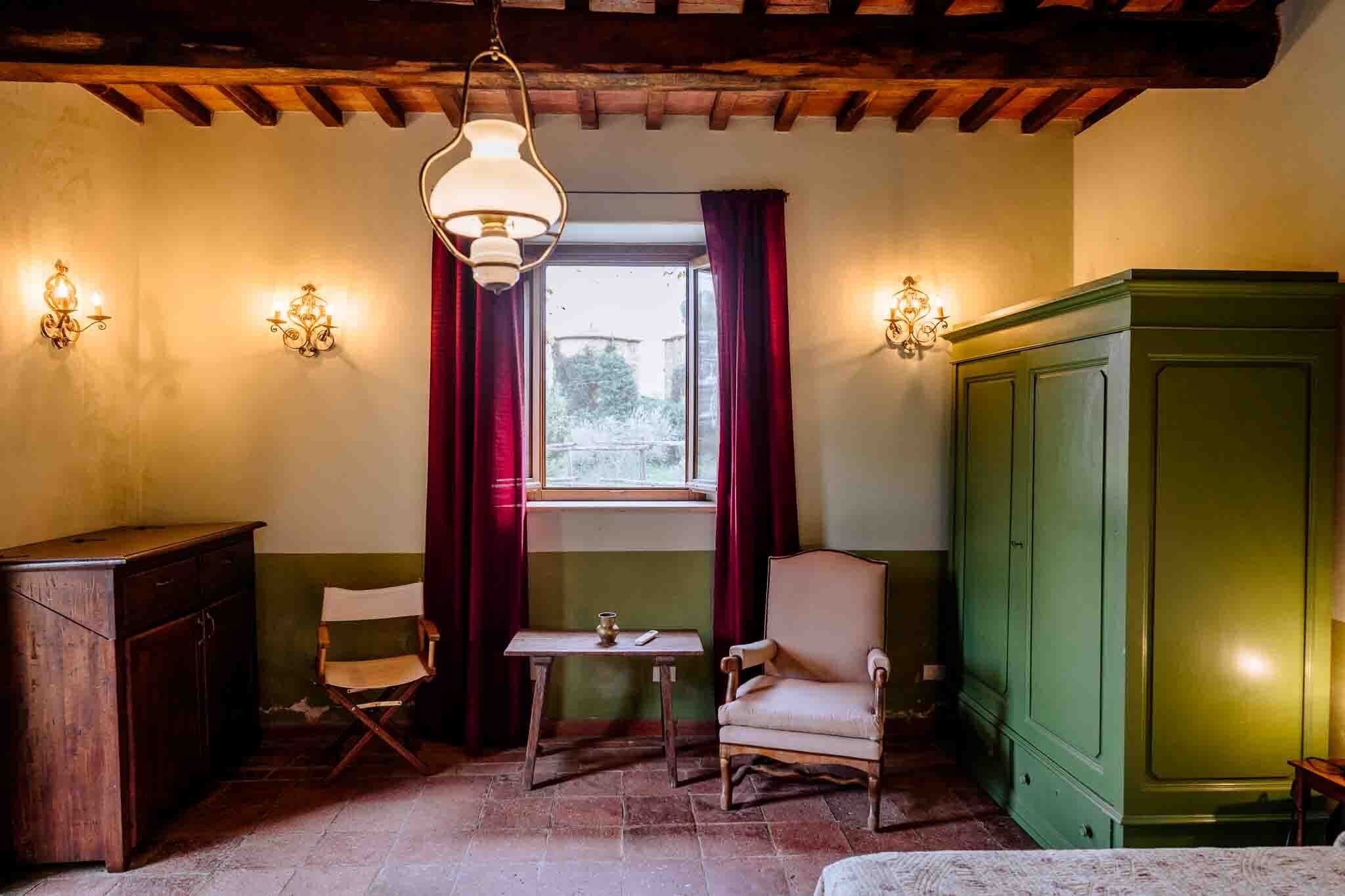 Deluxe Triple Room, Garden View | Living area | 20-inch TV with satellite channels