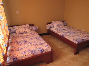 Standard Twin Room | Iron/ironing board, WiFi - Shika Tours and Hostel (Arusha)