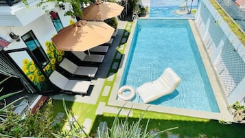 Outdoor pool, open 6:00 AM to 8:30 PM, pool umbrellas, pool loungers