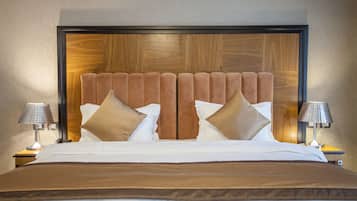 Deluxe Quadruple Room, Park View, Tower | In-room safe, desk, soundproofing, iron/ironing board