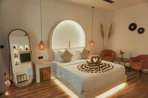 Deluxe Room, Pool View | Premium bedding, minibar, in-room safe, desk