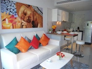 Apartment, 1 Bedroom, Garden View | Living room | TV, DVD player - Emerald Patong 1 bedroom Apartment Garden View (Patong)