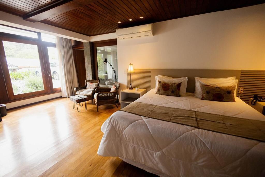 Suíte Master Éden Com Banheira de Higromassagem Dupla | Hypo-allergenic bedding, minibar, blackout curtains, free WiFi