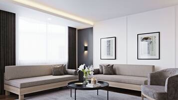 Suite | Oppholdsområde | En 127-centimeters LED-TV med Parabol-TV samt TV