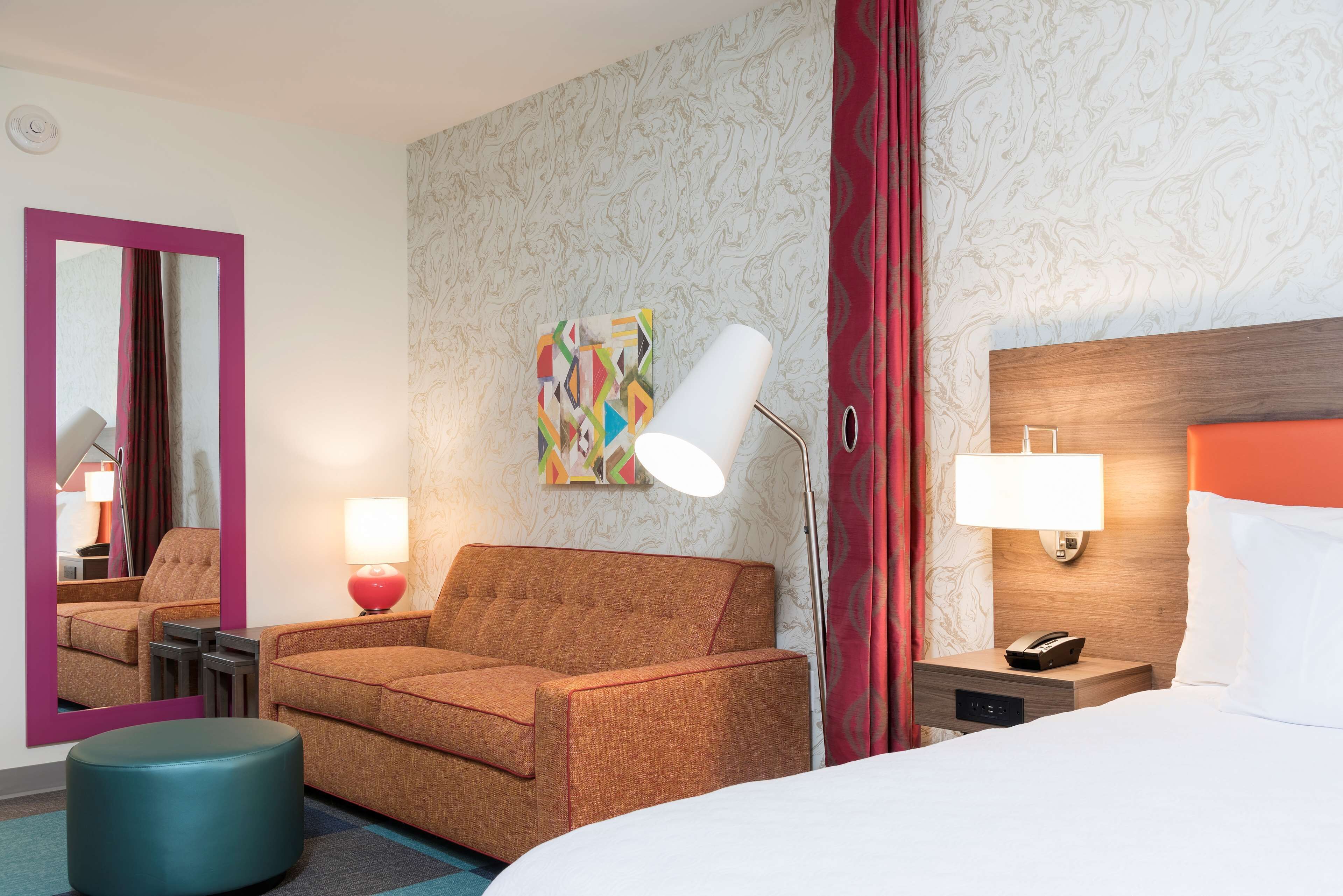 desk, iron/ironing board, bed sheets