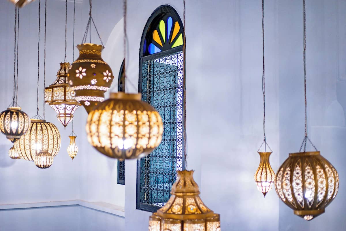 Hanging ornate lanterns and a stained glass window.