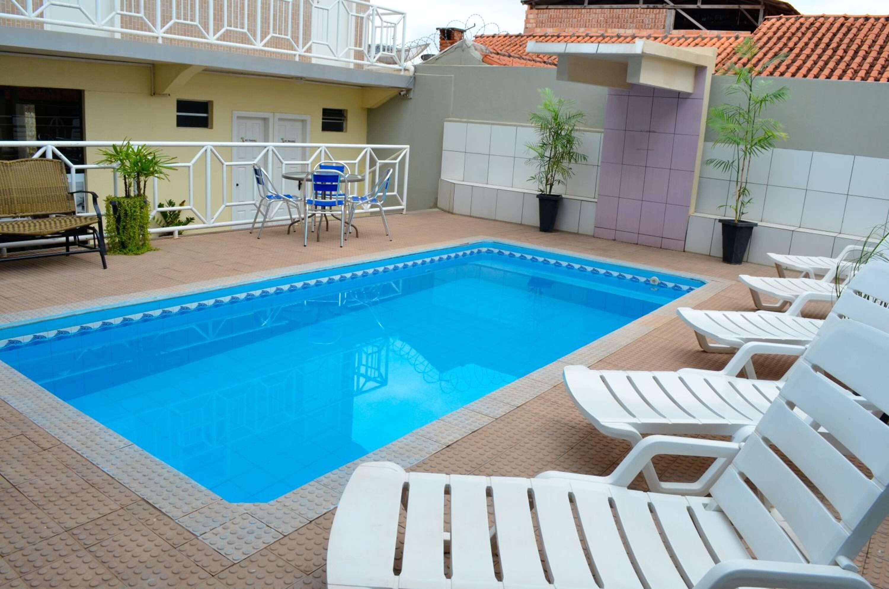 outdoor pool, pool loungers