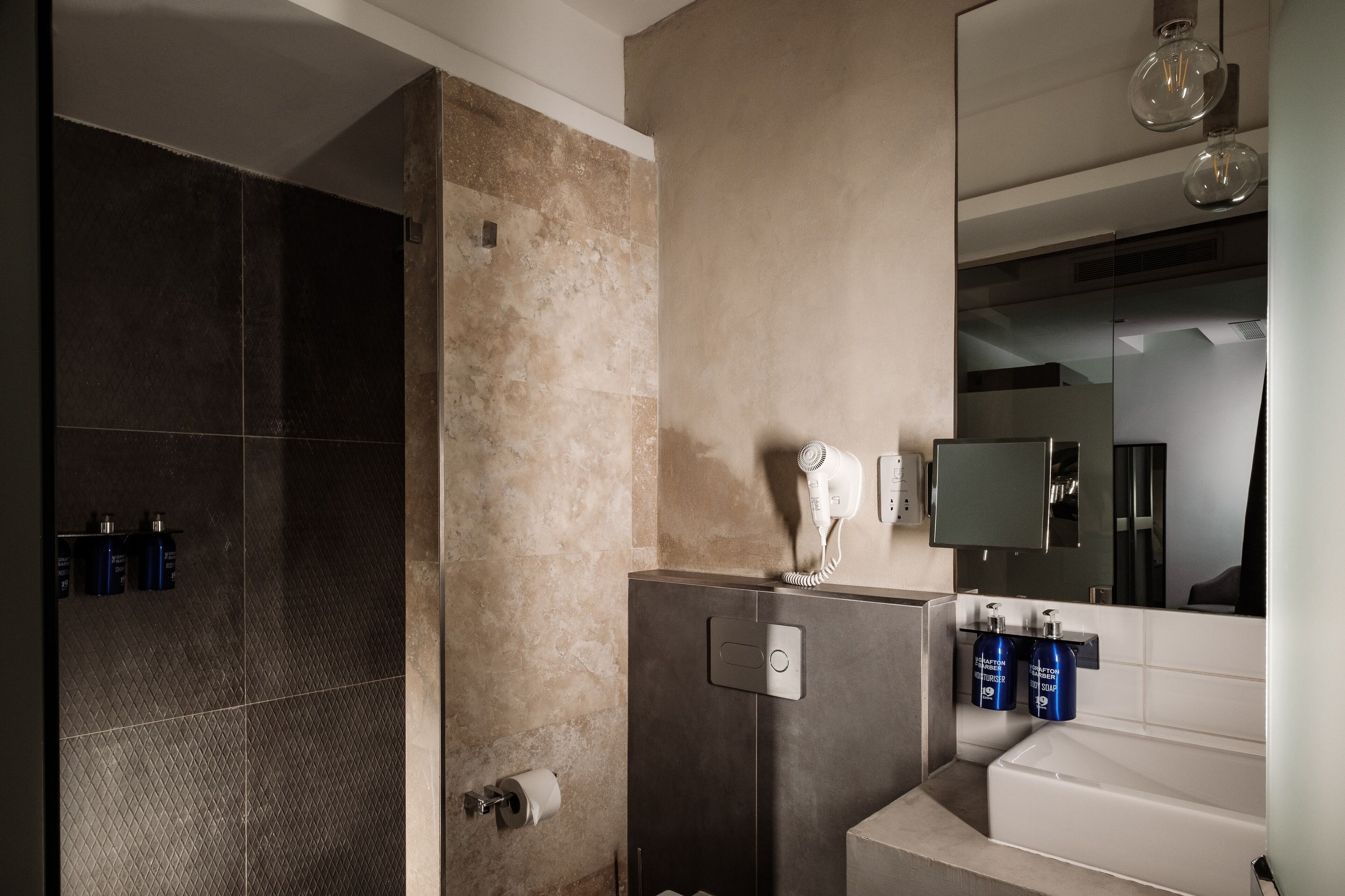 deluxe double room | bathroom | hair dryer, towels