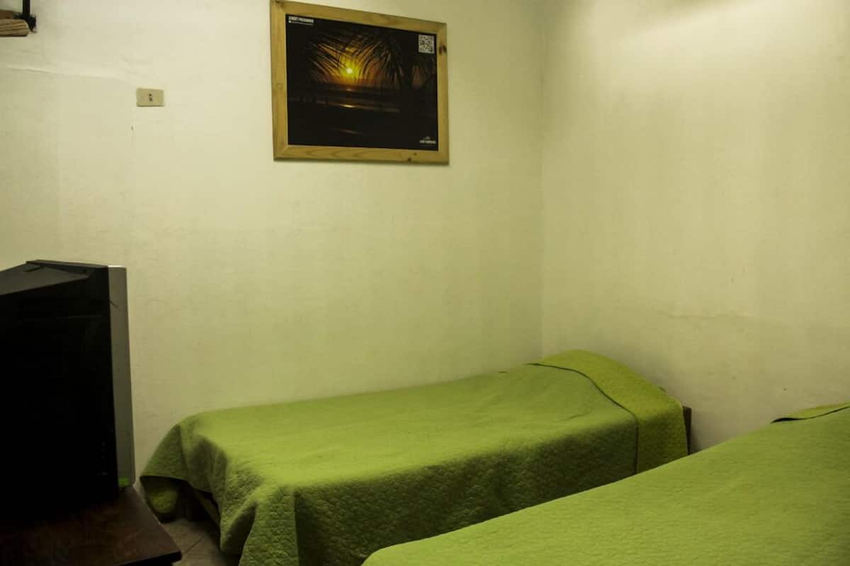 Suite Classique, 2 lits une place, salle de bains privée