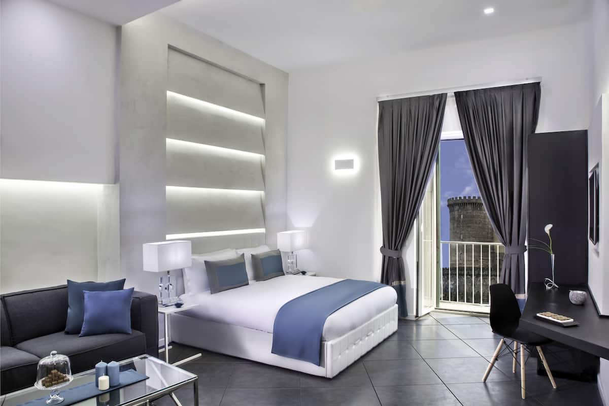 Junior Suite, City View | Premium bedding, minibar, in-room safe, desk