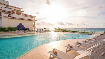 2 outdoor pools, pool umbrellas, sun loungers