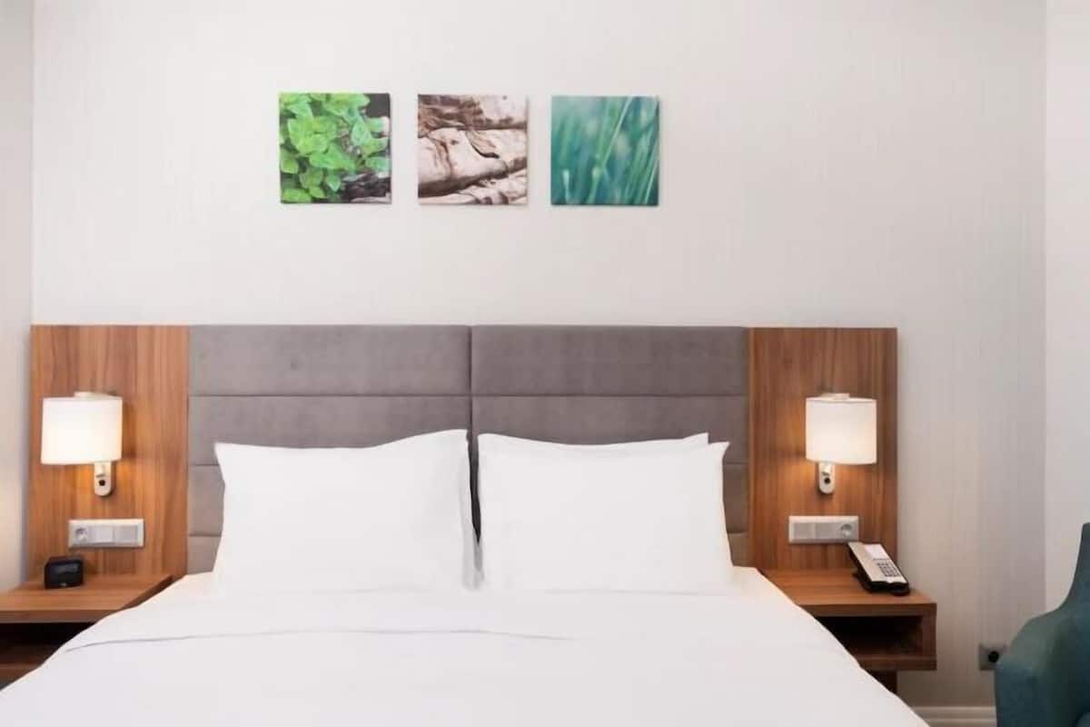 In-room safe, desk, laptop workspace, blackout curtains