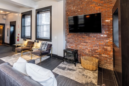 Luxury House, 6 Bedrooms | Living area | Flat-screen TV. The Firehouse