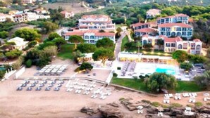 A coastal hotel with multiple buildings, a beach, and a swimming pool. - The Bay (Zakynthos)