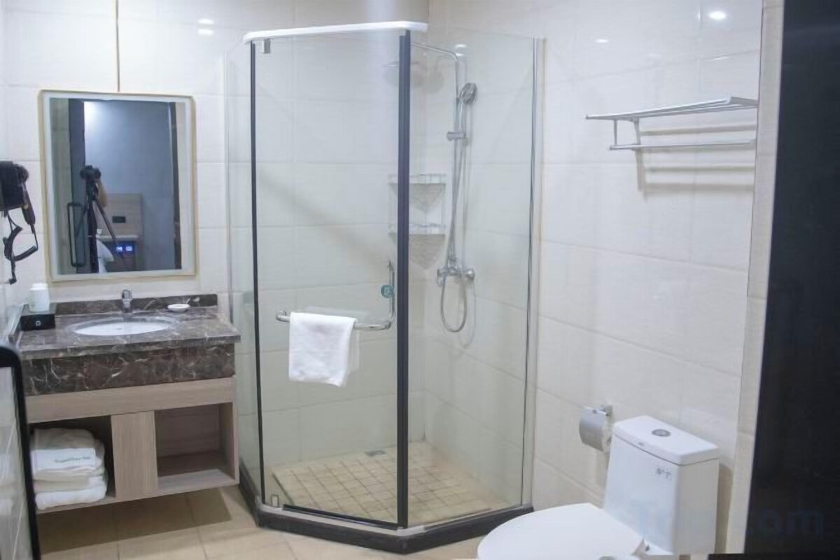 Shower, free toiletries, hair dryer, slippers