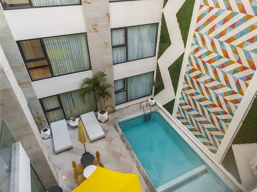 Outdoor pool, open 9:00 AM to 9:00 PM, pool umbrellas, sun loungers