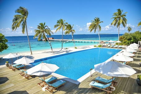 Outdoor pool, pool umbrellas, sun loungers