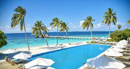 Reethi Faru Resort - Stay 5 Nights or more & Enjoy a Free Sunset Cruise