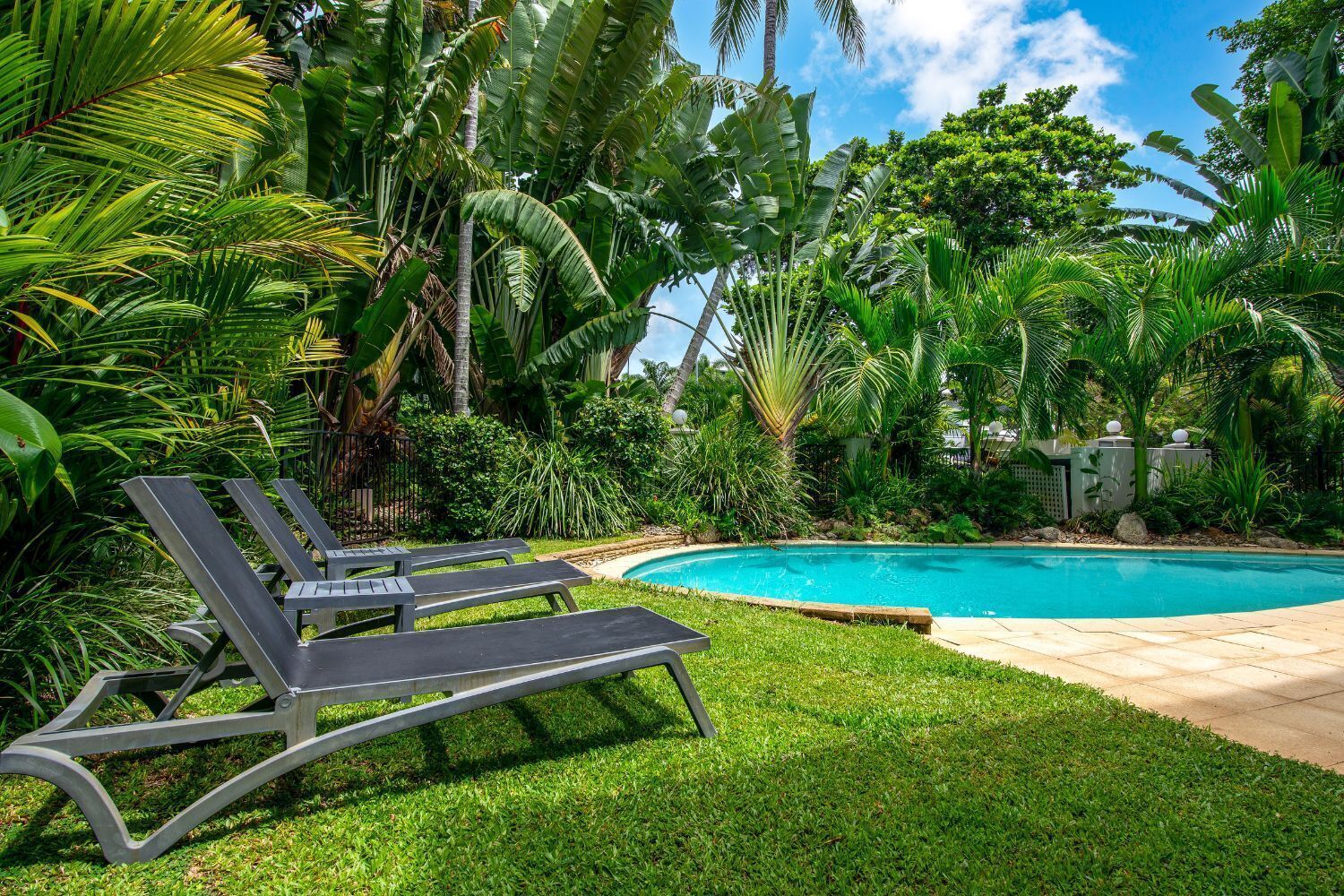 2 outdoor pools, open 8:00 AM to 8:00 PM, pool umbrellas, pool loungers