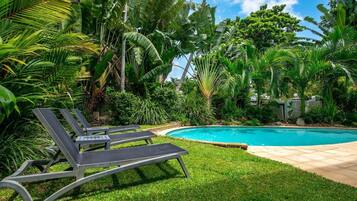 2 outdoor pools, open 8:00 AM to 8:00 PM, pool umbrellas, pool loungers